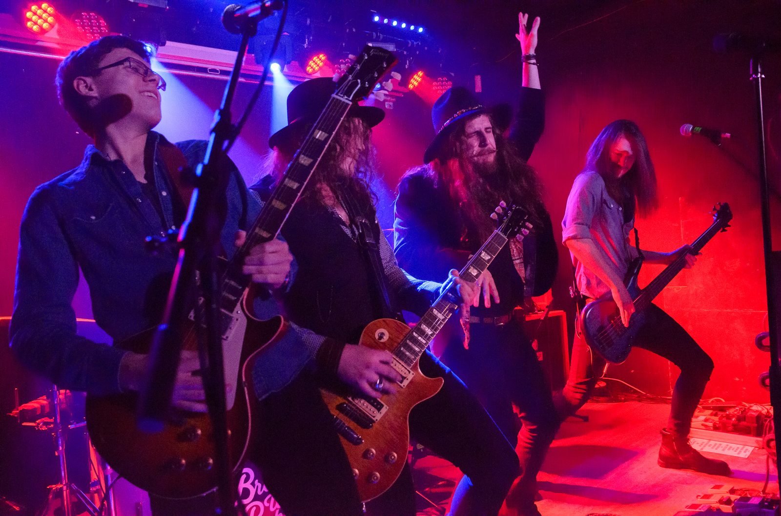Band on stage, dramatic lighting